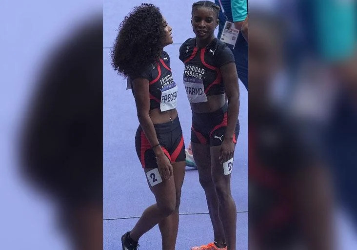 THE FUTURE: Young Trinidad and Tobago sprinters Sanaa Frederick, left, and Leah Bertrand, after the second Olympic Games women’s 4x100 metres qualifying round heat at the Stade de France, in Paris, on Thursday. The Team TTO quartet--Akilah Lewis, the Frederick twins, Sole and Sanaa, and Bertrand--clocked 43.99 seconds to finish eighth. They did not advance to the final. Bertrand was the T&T flagbearer at yesterday’s closing ceremony at Stade de France.  —Photo: BRENT STUBBS (Image obtained at trinidadexpress.com)