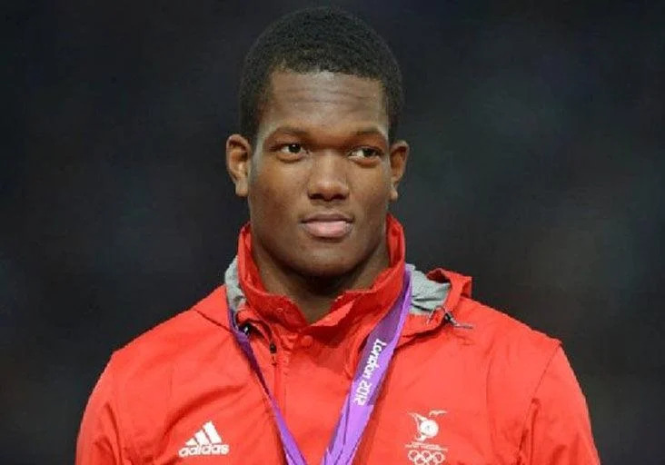 FLASHBACK: Trinidad and Tobago’s Keshorn Walcott  poses proudly on the podium with his 2012 Olympic Games men’s javelin gold medal in London, England. (Image obtained at trinidadexpress.com)