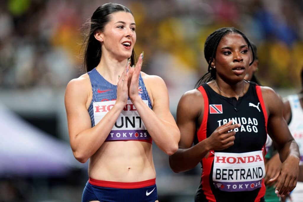 In this file photo, Britain's Amy Hunt, left, and TT's Leah Bertrand react after competing in the women's 100 metres heat at the World Athletics Championships in Tokyo, on September 13, 2025. - AP PHOTO (Image obtained at newsday.co.tt)